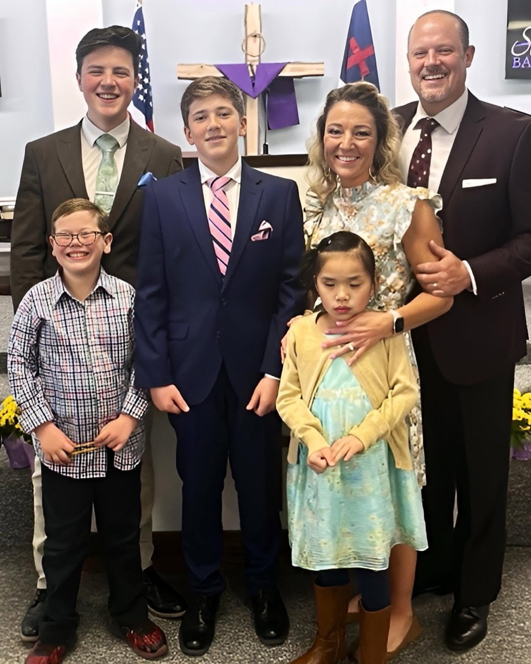 Nathan and his family dressed for a Sunday service at their church